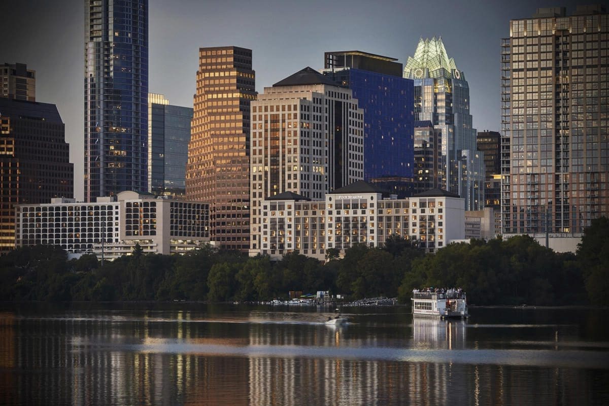 A photo of building in downtown Austin Texas in the evening